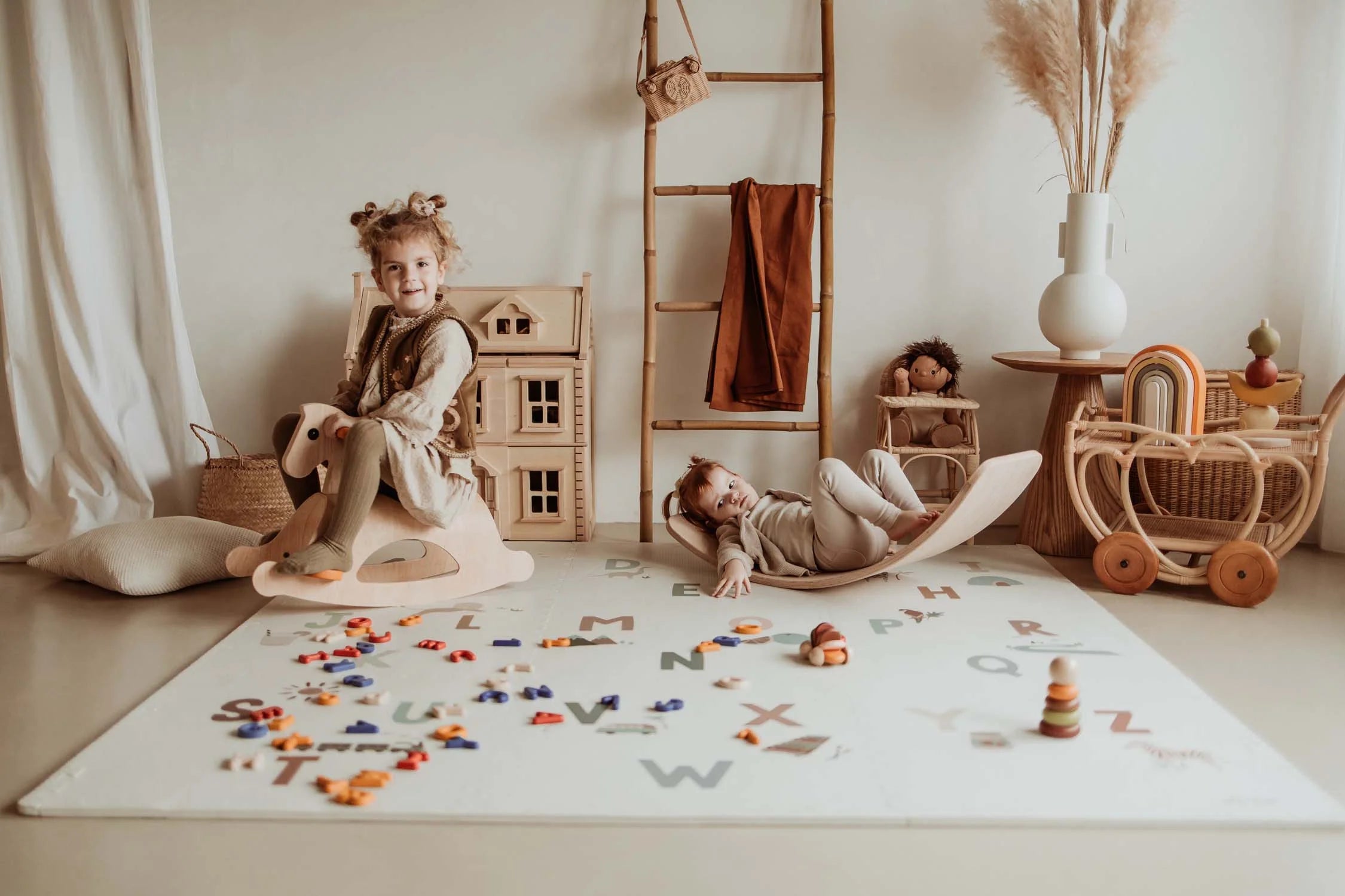 Play & Go Tiloo alphabet puzzlemat, storage box, and mini house