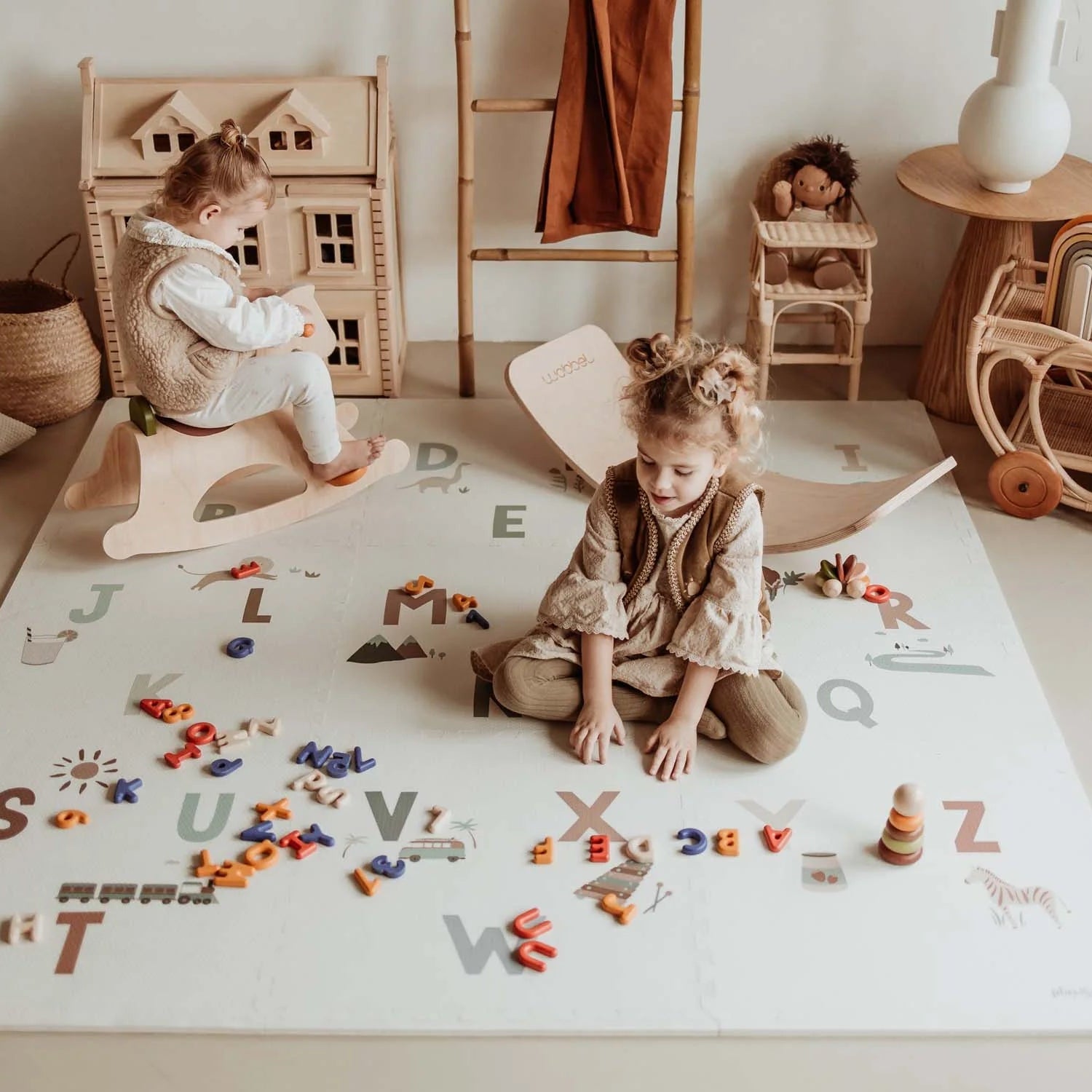 Play & Go Tiloo alphabet puzzlemat, storage box, and mini house