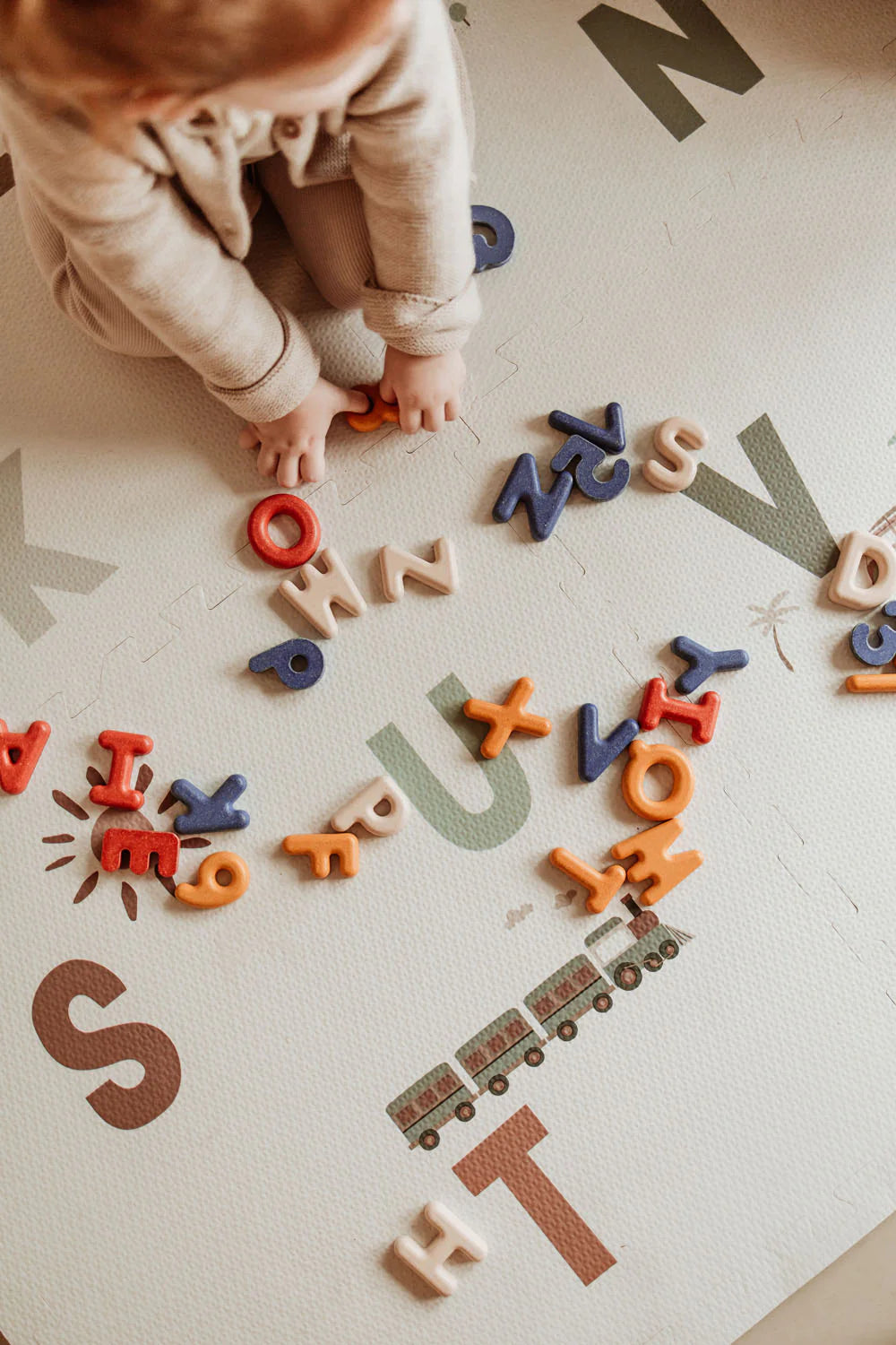 Play & Go Tiloo alphabet puzzlemat, storage box, and mini house